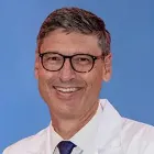 Retrato profesional del Dr. Antonio González, uno de los 15 ponentes en ONCOMING 2026.